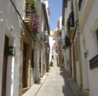 Javea's old town has narrow streets lined with shops. Villa for sale Javea